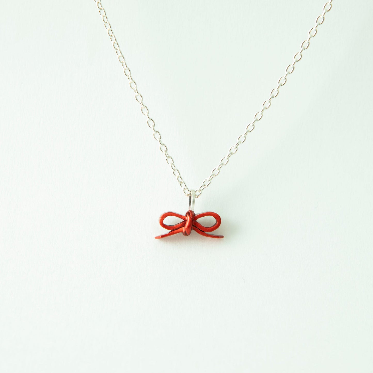 “Through the Ribbon” - Necklace & Pierce