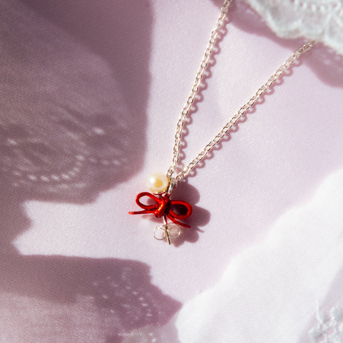 “Through the Ribbon” - Necklace & Pierce