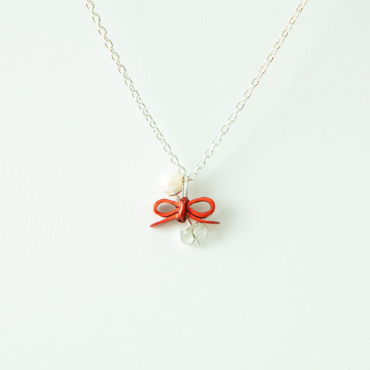“Through the Ribbon” - Necklace & Pierce